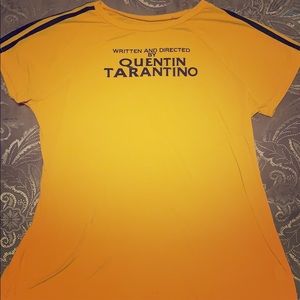 Yellow tee shirt .